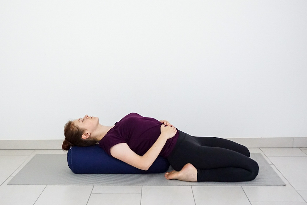 Perfect your yoga postures using a yoga cushion